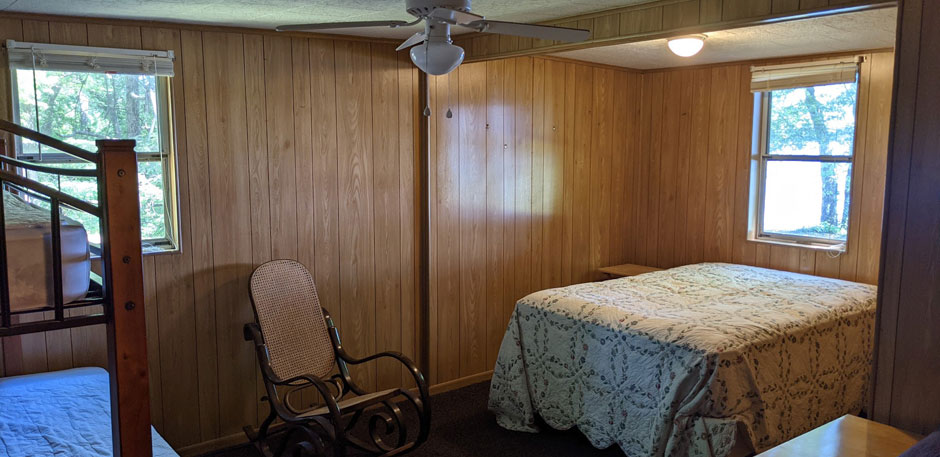 Interior bedroom area with bed - Musky Lodge Susquehanna River Vacation Rental in Pennsylvania